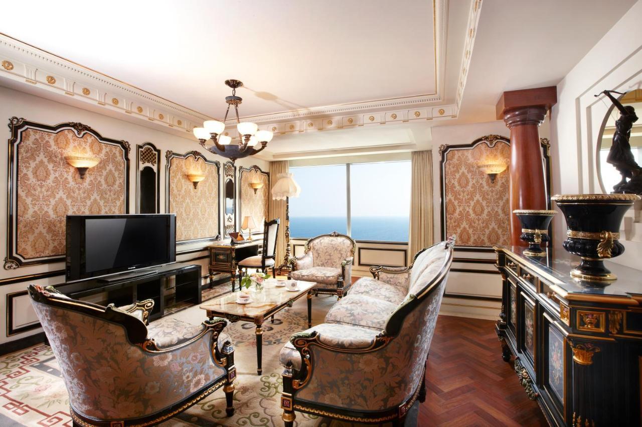 Haeundae Grand Hotel Ciudad Metropolitana de Ciudad Metropolitana de Busan Exterior foto A living room in a suite at the hotel