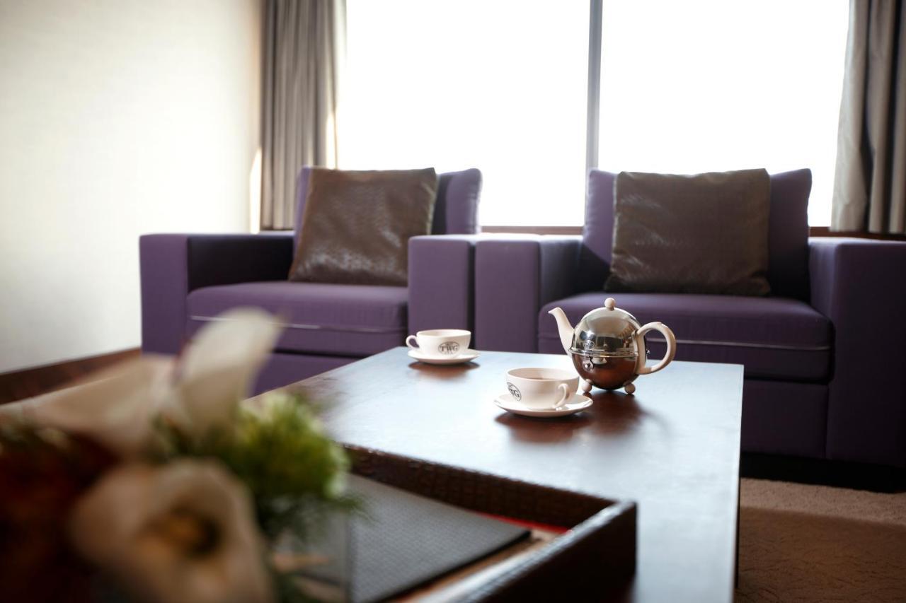 Haeundae Grand Hotel Ciudad Metropolitana de Ciudad Metropolitana de Busan Exterior foto A living room at the hotel